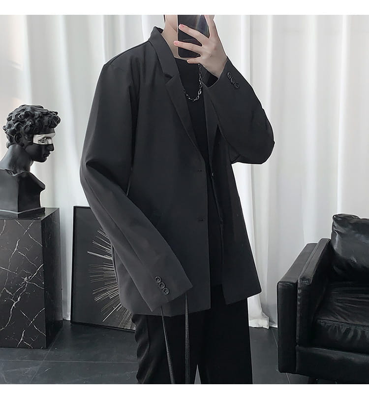 schwarzer übergroßer Blazer mit Dreiknopf-Manschetten und legerer Passform aus der Kollektion Herren-Casual-Loose-Blazerjacke in einfarbigem Stil