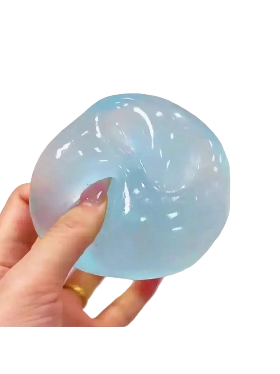 A translucent light blue moldable slow rebound stress ball with subtle internal swirls and a smooth glossy surface view