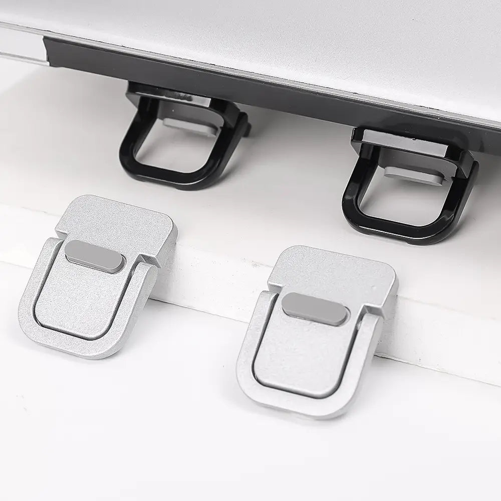 Silbermetallische Mini-Laptopständer-Klemmen mit elegantem minimalistischen Aluminiumdesign und schwarzen gummierten Griffen zur Verwendung als tragbarer Schreibtischaufsatz