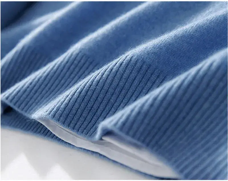 Men cashmere v neck pullover sweater in soft blue ribbed knit with subtle texture and white inner lining.