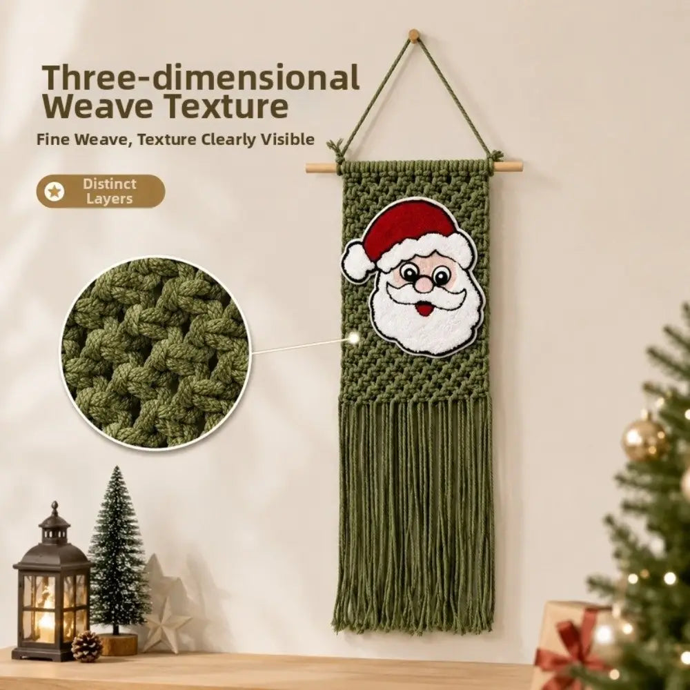 Olive green macrame Christmas wall hanging tapestry featuring an embroidered Santa face with a red hat and white beard.
