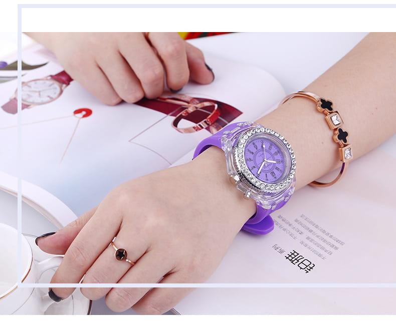 Purple silicone led luminous watch with a clear crystal rhinestone-encrusted bezel and matching purple dial digital timepiece.