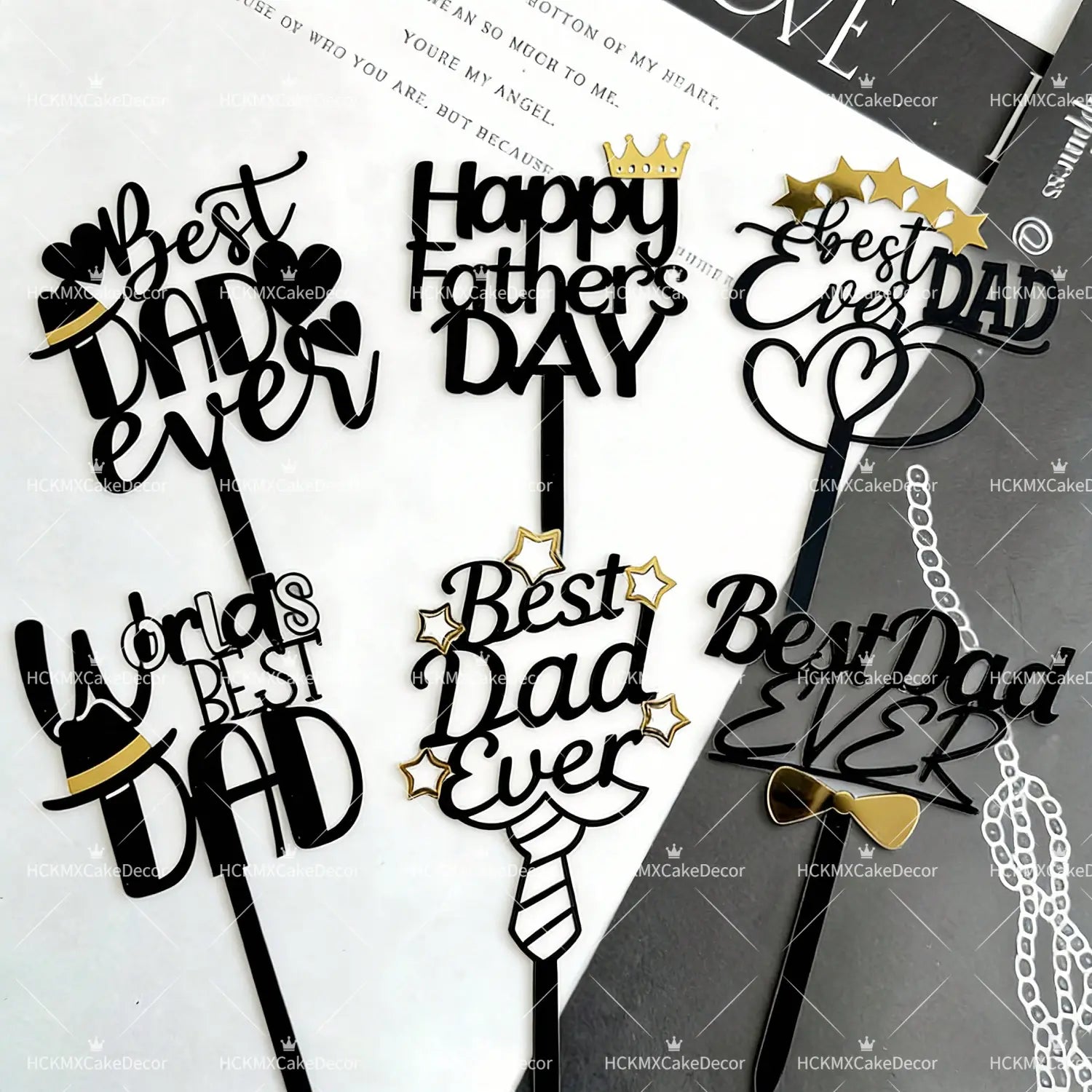 black and gold fathers day acrylic cake topper set featuring decorative crowns stars ties and bowties for celebration cakes