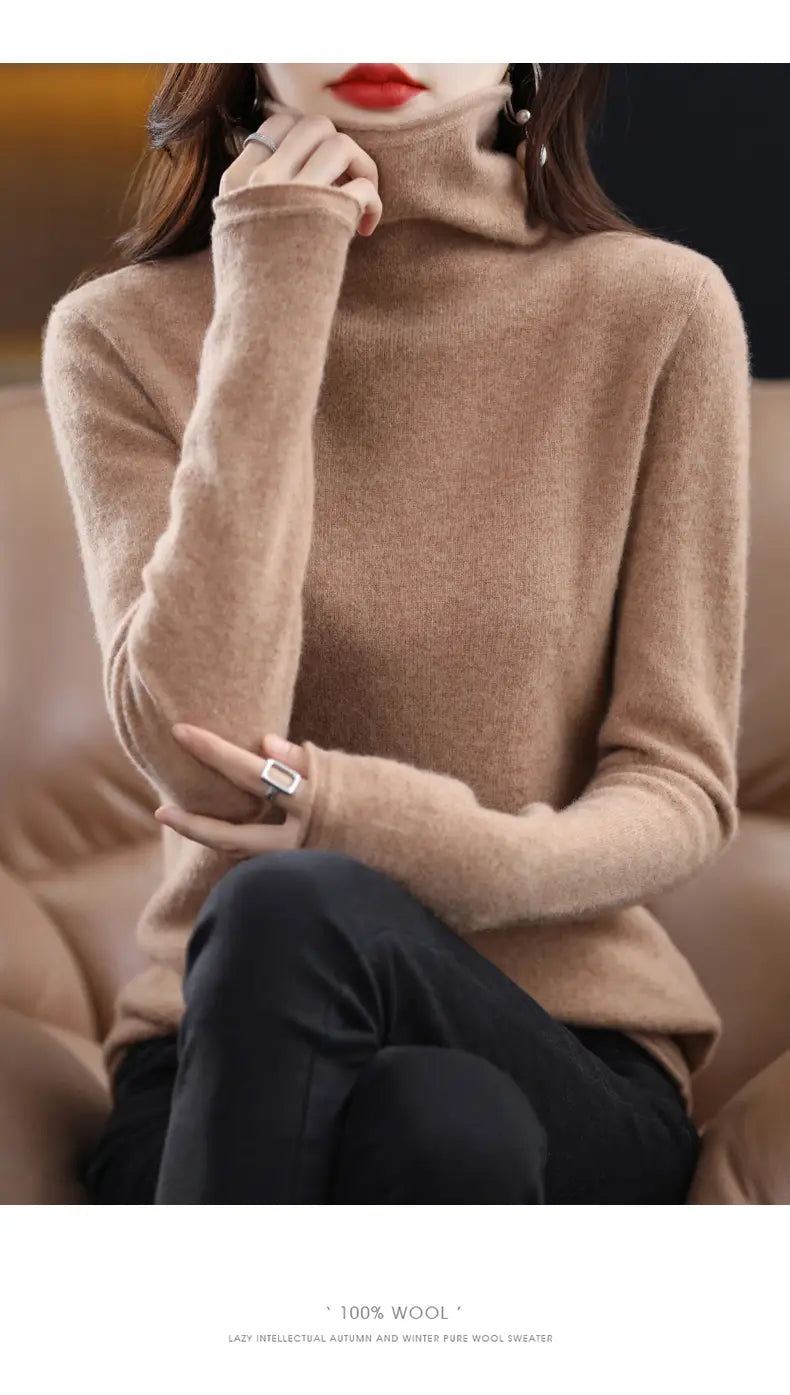 A soft beige merino wool turtleneck sweater for women featuring a smooth knit texture and long sleeves.
