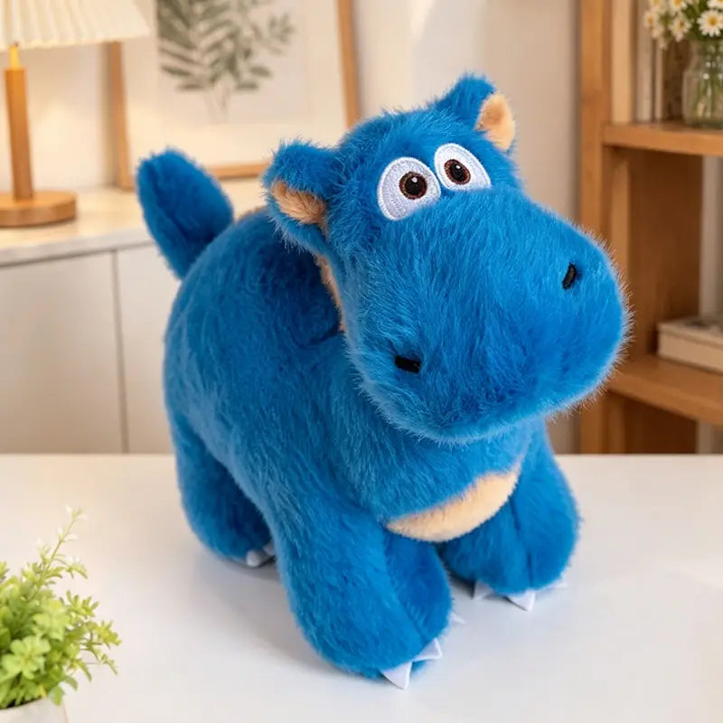 Jouet peluche de hippopotame bleu avec des accents beige sur les oreilles, le ventre et les griffes, peluche souple pour les enfants