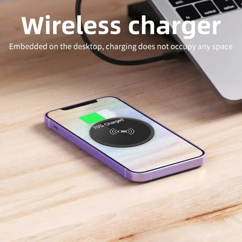 Purple embedded desk wireless charger fast 15w with a black circular magnetic surface displaying 70 percent charged and wi-fi symbol.