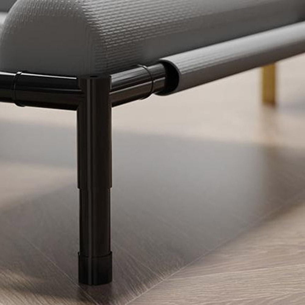 Gray textured fabric dog bed with breathable mesh and black metal legs elevated pet cot for improved air circulation and comfort.