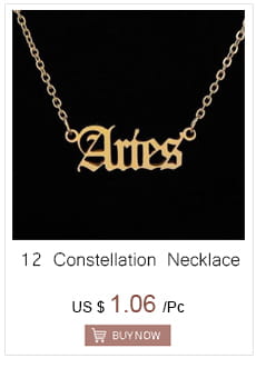 Gold-colored elegant cursive artes pendant necklace with a delicate chain from the gold angel number 7 necklace collection.