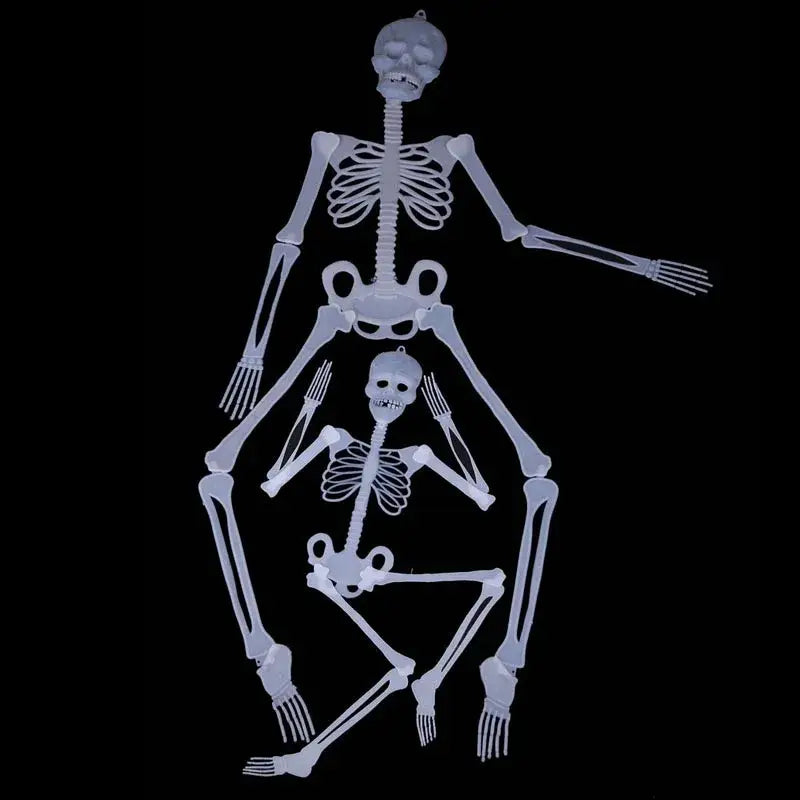 Translucent white plastic glow in the dark skull skeleton halloween props featuring a larger articulated figure seated atop a smaller one with detailed ribcages for haunted house decoration.