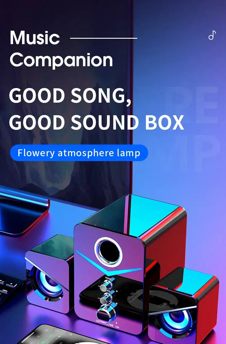 Système d’enceinte de jeu Bluetooth en forme de cube violet et rouge avec caisson de basses à DEL, doté de lumières DEL bleues éclatantes autour des haut-parleurs.