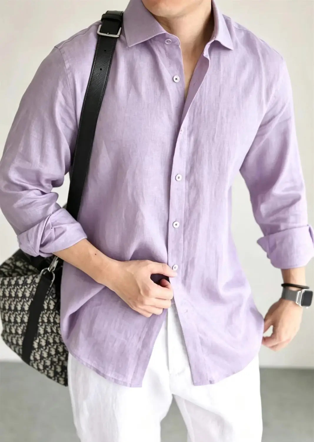 Men cotton linen casual button-down shirt in lavender linen with rolled-up sleeves and a classic collar.