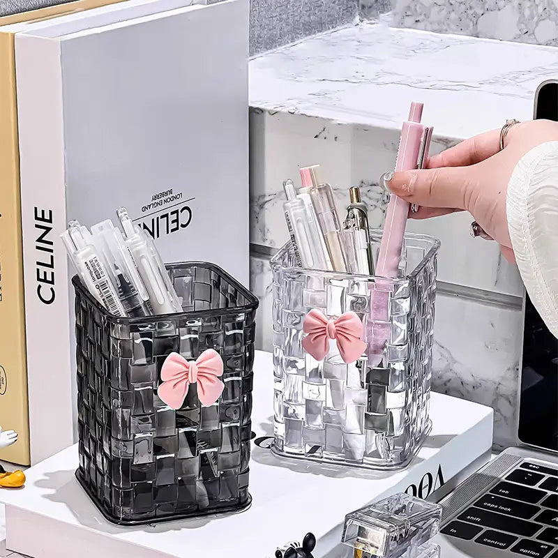 bow pen holder desktop storage organizer featuring clear and black woven plastic pen holders each adorned with a pink bow for stylish desk organization