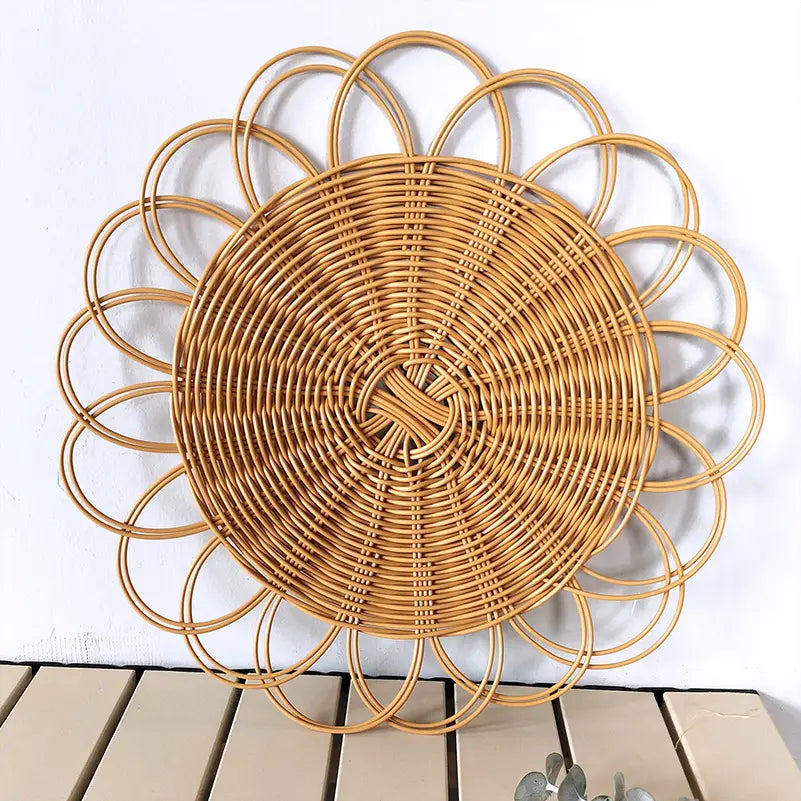 Natural-toned woven rattan flower wall hanging decor featuring a sunburst design placemat.