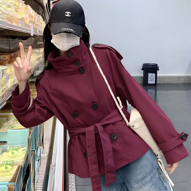 Fashion Belt Short Trench Coat Women Stand Collar Double Breasted Long Sleeve Jacket 2026 Spring Autumn New Lady Street Outwear