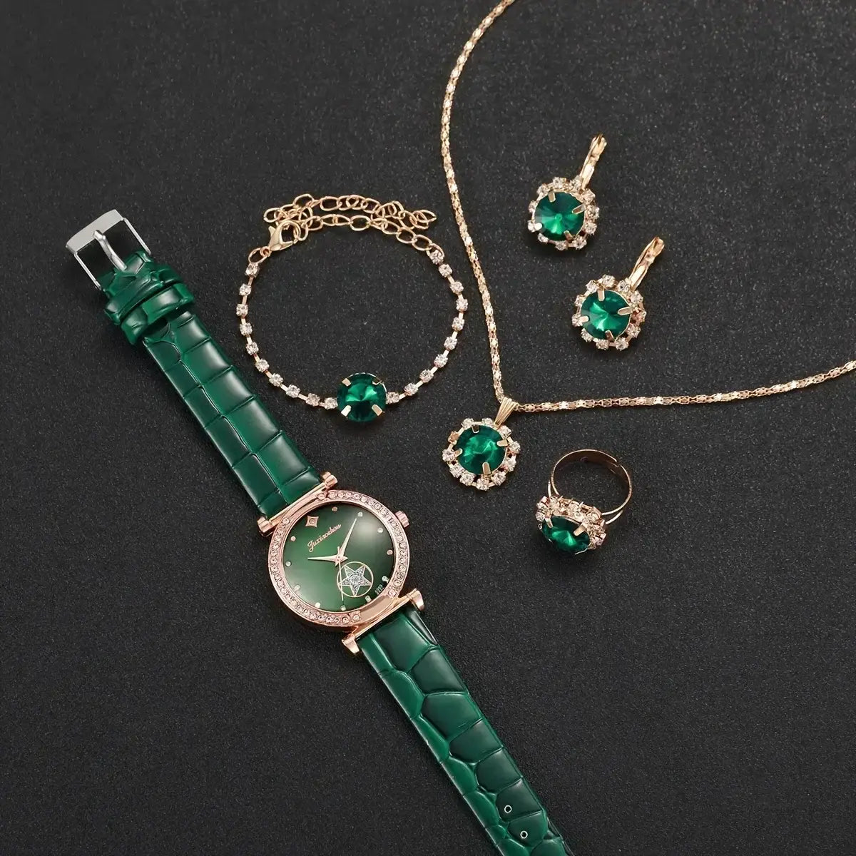 Emerald green crocodile-patterned leather strap green quartz watch for women with a rose gold case and crystal-encrusted bezel.