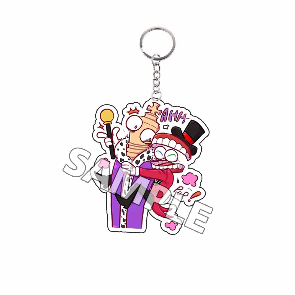 Llavero acrílico colorido que presenta a dos personajes caricaturescos en un abrazo juguetón; uno como mago con sombrero de copa y el otro sosteniendo un micrófono dorado. Forma parte de la colección de productos terminados de personajes caricaturescos Tadc.