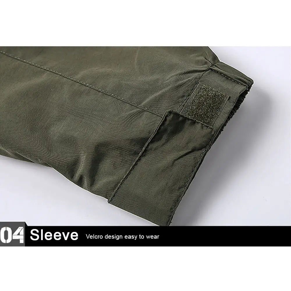 olive green sleeve with velcro closure and reinforced stitching on the men’s waterproof tactical hooded jacket