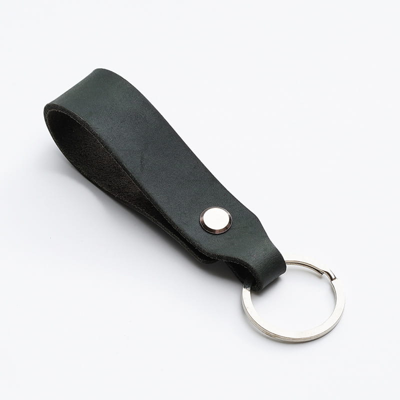 Black leather car keychain set with a silver-toned metal ring and button fastening genuine lanyard key holder.