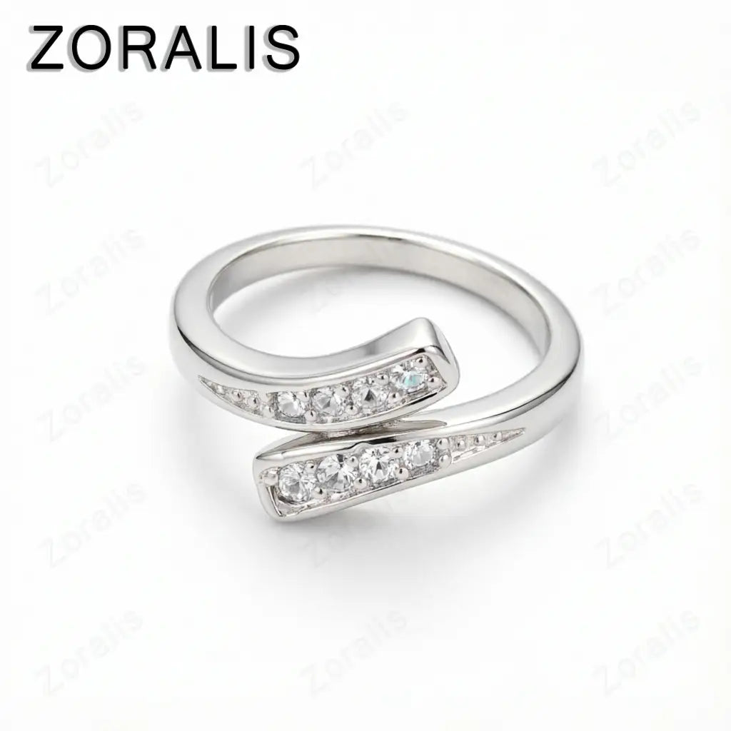Zoralis verstellbarer Zirkonring aus 18k Gold für Damen mit einem eleganten Silbendesign und zwei sich kreuzenden Bändern, verziert mit klaren kubischen Zirkonia-Steinen.