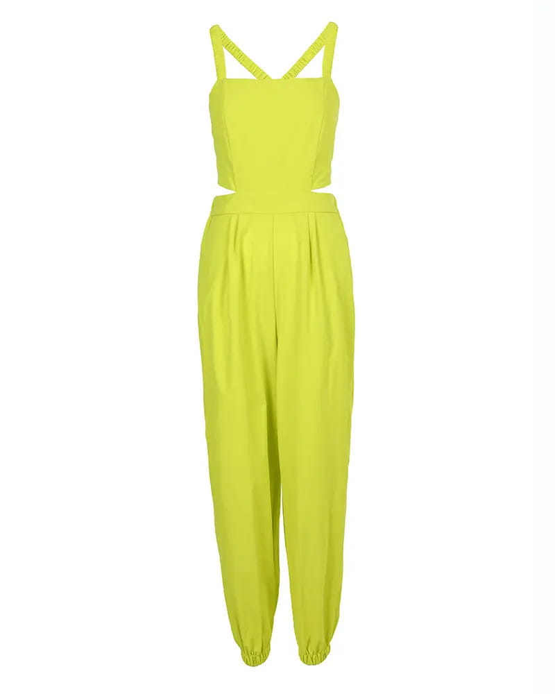 Women summer printed cutout jumpsuit in bright lime green featuring crossed shoulder straps and waist cut-out detail.
