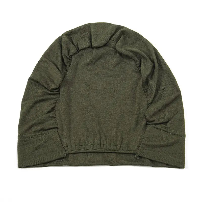 olive green knit beanie with elasticated cuffs and a slightly gathered crown from the stretchy jersey hijab cap and turban set