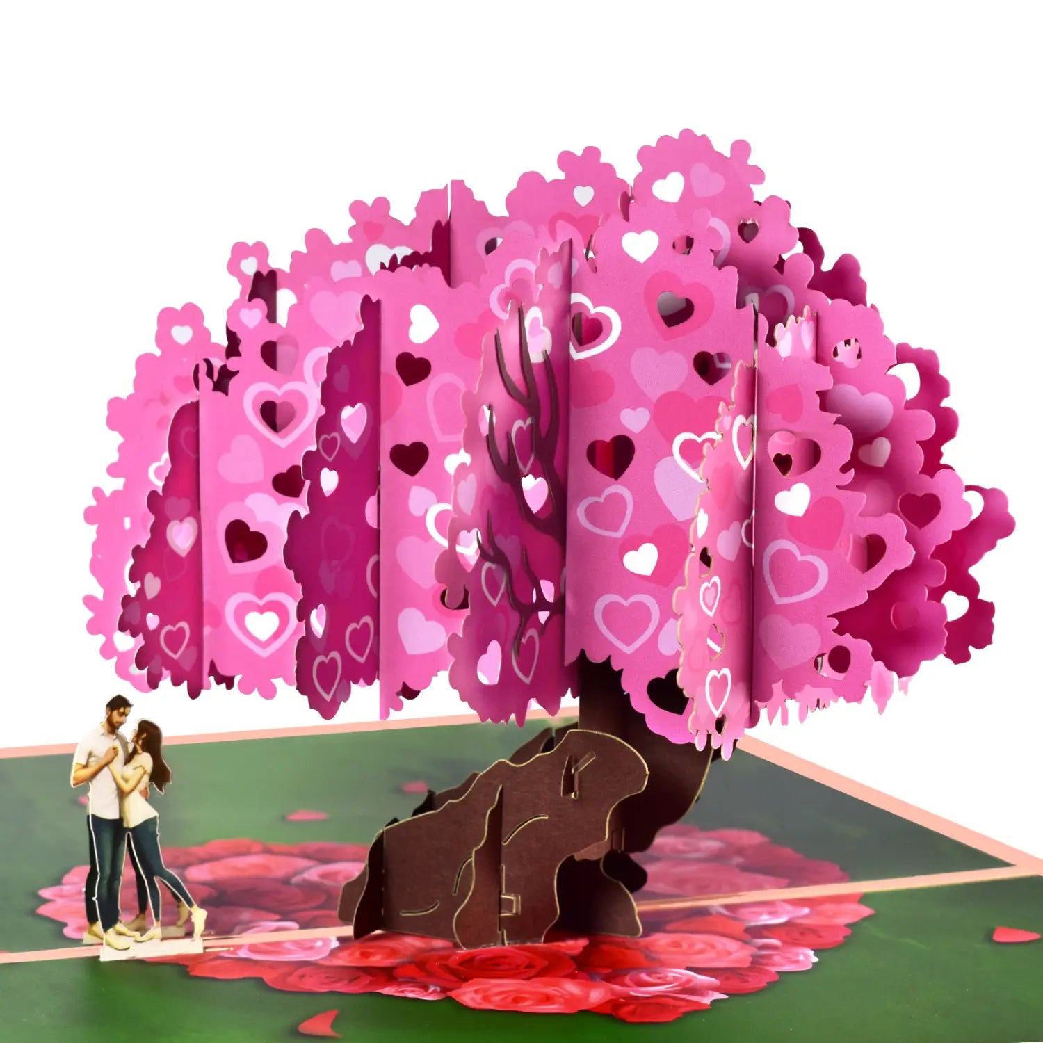 Une carte de la Saint-Valentin 3D à effet pop-up rose éclatant, présentant un arbre tridimensionnel avec des découpes en forme de cœur et des pétales superposés, avec un couple romantique enlacé en dessous, pour un ensemble de salutation.