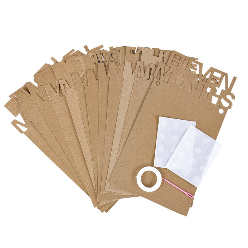 brown cardboard cutout letter set for baby milestone countdowns used in a 1st birthday photo banner monthly picture garland.