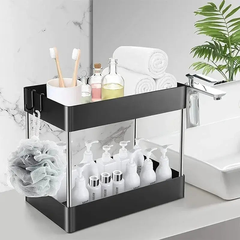Organizador negro de almacenamiento bajo el fregadero, de dos niveles, con costados de vidrio transparente y bastidor de acero inoxidable para almacenamiento multifuncional tipo cajón por niveles en el baño.
