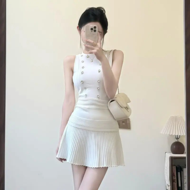 Women Chic Two Piece Set Sleeveless Knit Tank Top and High Waist Pleated Mini Skirt Pearl Detail Slim Fit Suit Minimalist Outfit