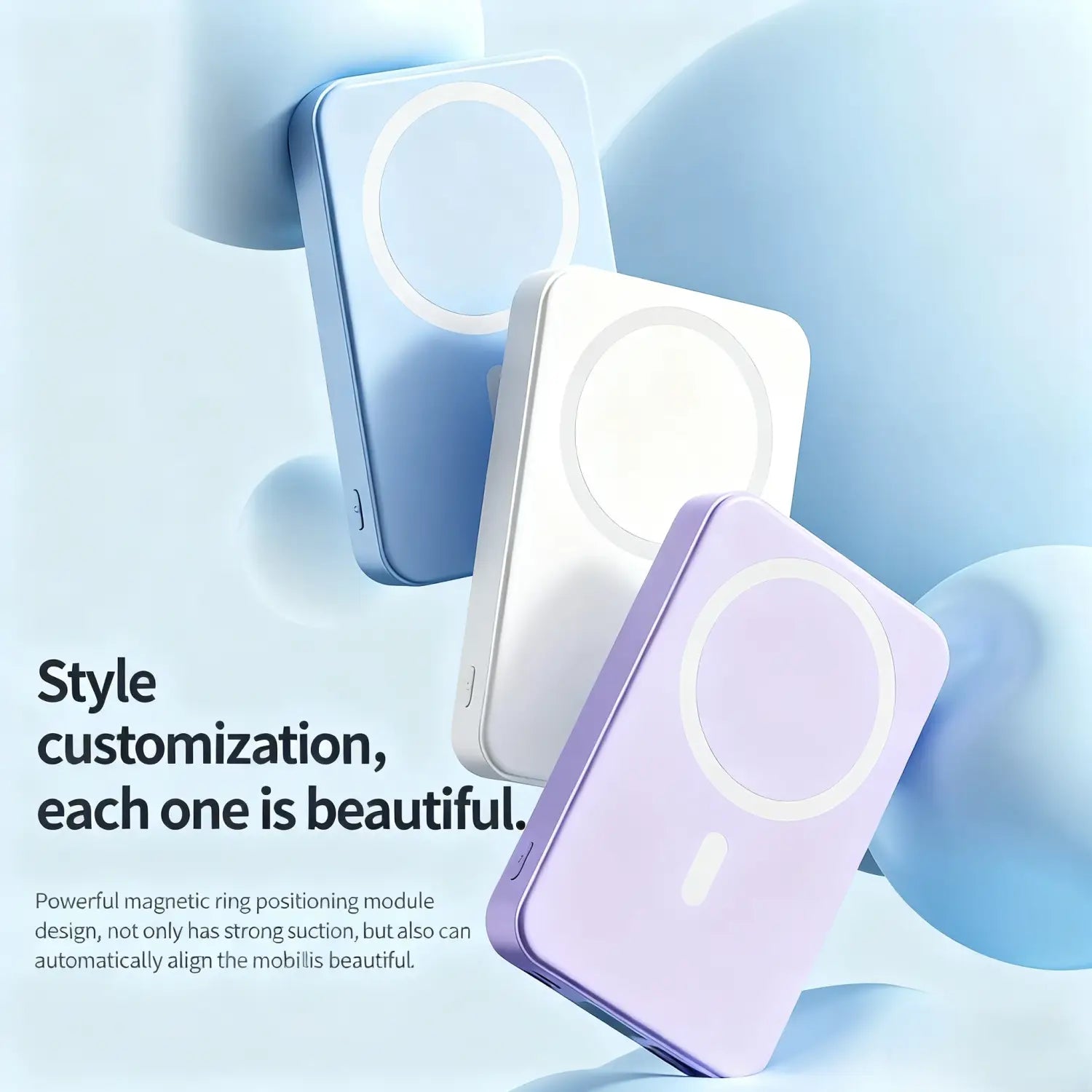 Drei elegante kabellose Ladegerät-Powerbanks mit Ständer in Pastellblau, Weiß und Lavendel mit kreisförmigen magnetischen Schnellladepads auf der Vorderseite.