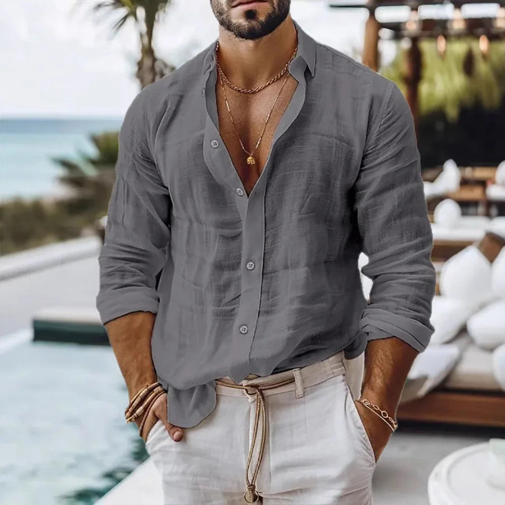 Men’s linen beach shirt in gray with button-down front, rolled sleeves, and a relaxed fit made from breathable linen fabric.