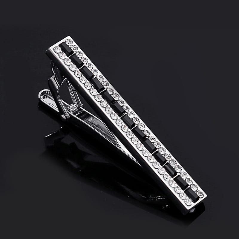 Silver tie bar adorned with alternating rows of clear and black rhinestones from the crystal rhinestone tie clip set.