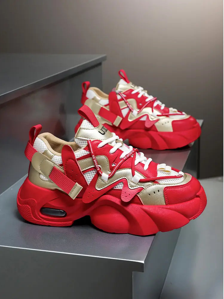 Men chunky air cushion casual sneakers in red and beige featuring a bold layered design and visible air cushioning for enhanced comfort.