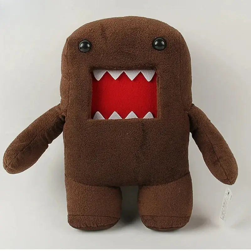 Jouet en peluche Domo kun de 20 cm, animal en peluche brun présentant des yeux à boutons noirs et une bouche rouge bordée de dents triangulaires blanches.