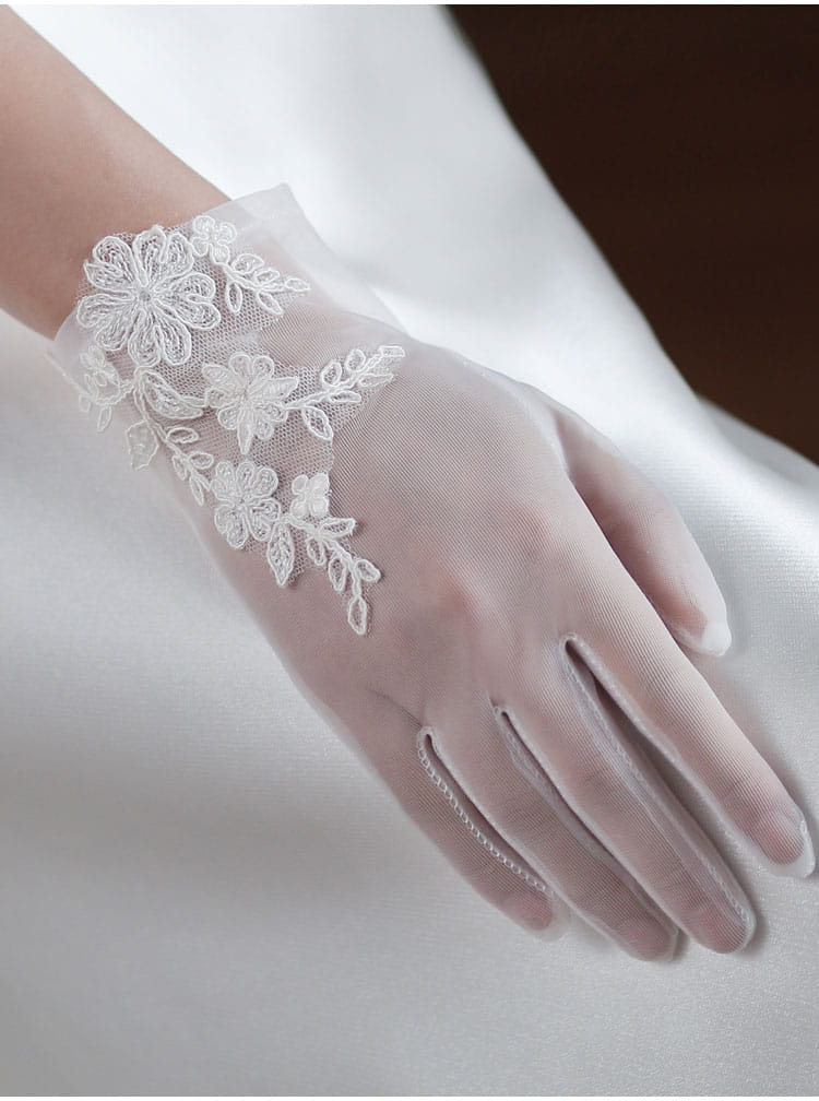 white lace bridal gloves short wedding tulle applique featuring delicate floral embroidery adorning the wrist.
