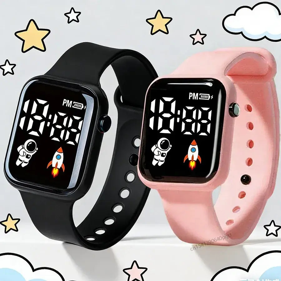 Montre électronique à bracelet noir et rose pour enfants, garçons et filles, avec affichage numérique LED de type sport et des motifs d’astronaute et de fusée à l’écran