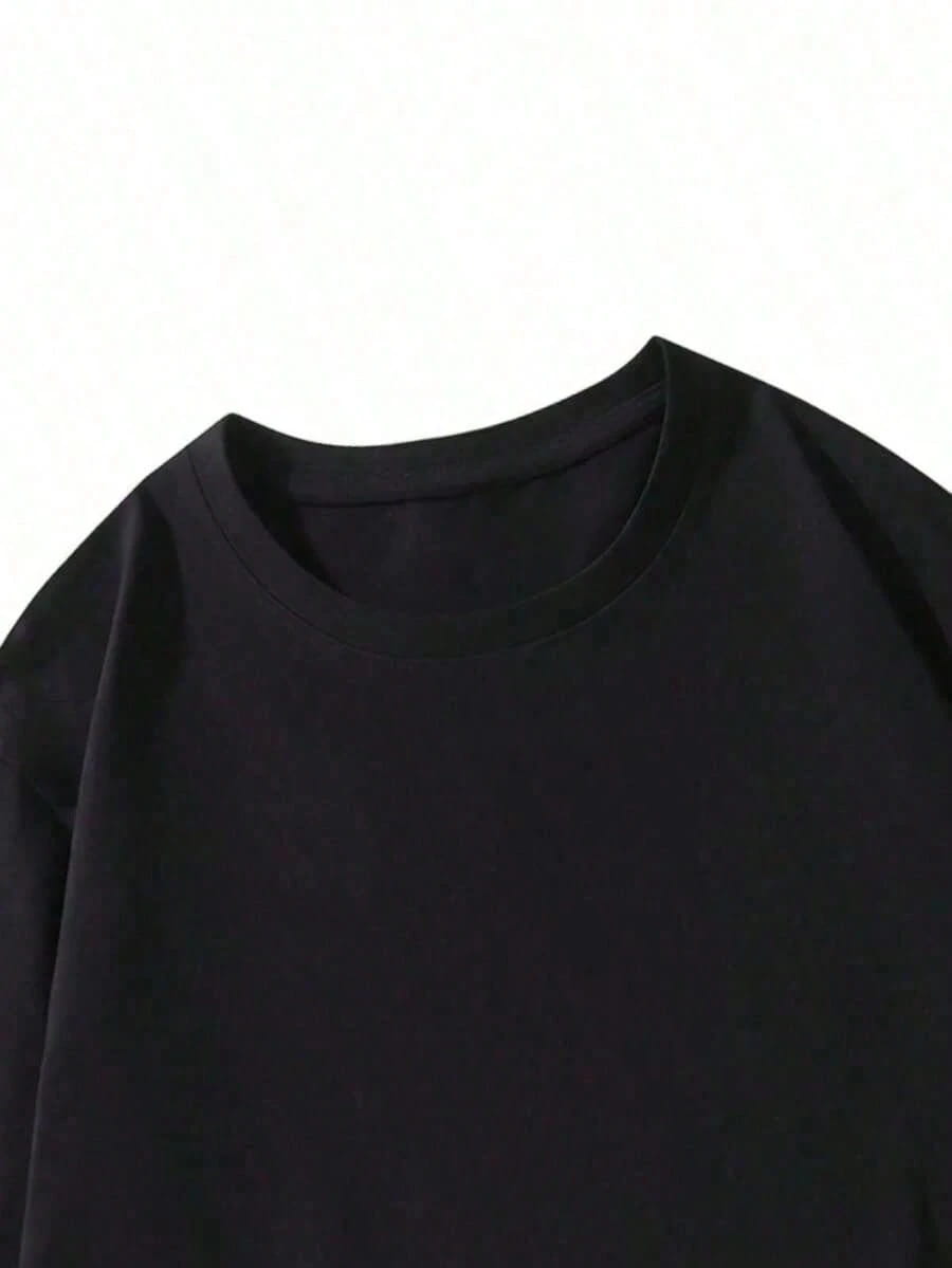 Black crew-neck graphic print oversized men short sleeve t shirt with smooth solid fabric finish.