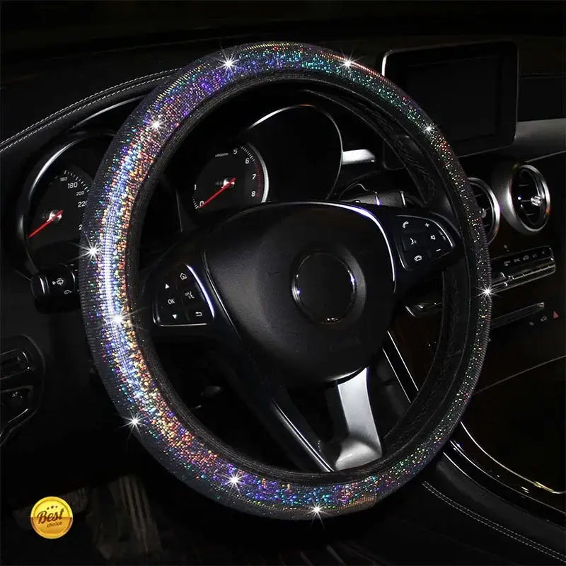 Juego de funda para volante con brillo rosa que presenta una funda para volante cubierta con pedrería iridiscente resplandeciente, diseñada para un interior de coche con estilo.