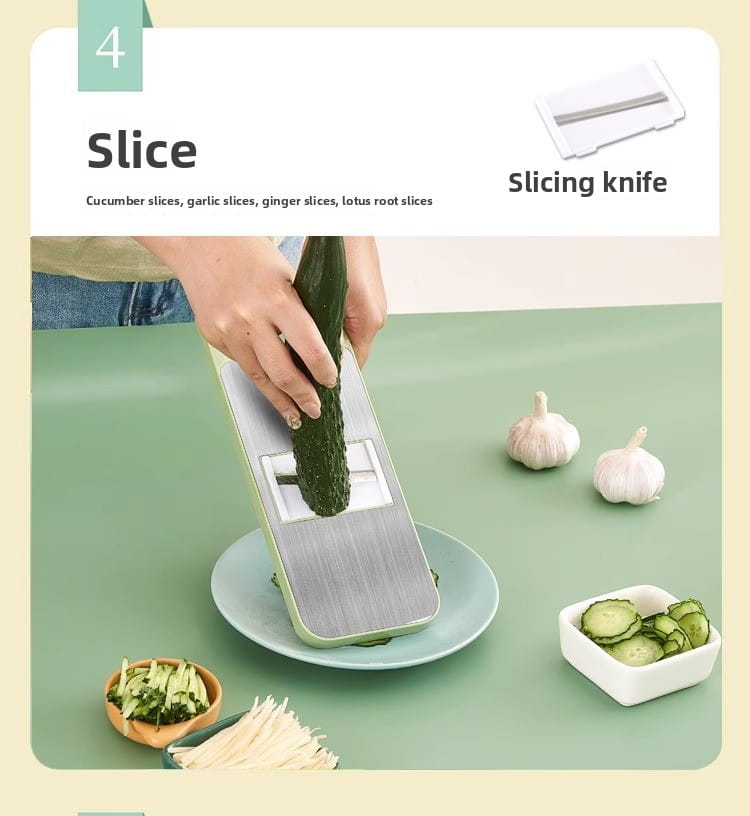 Multi-functional stainless steel vegetable slicer shredder in silver and green with a rectangular blade slot for slicing cucumbers garlic ginger or lotus root.