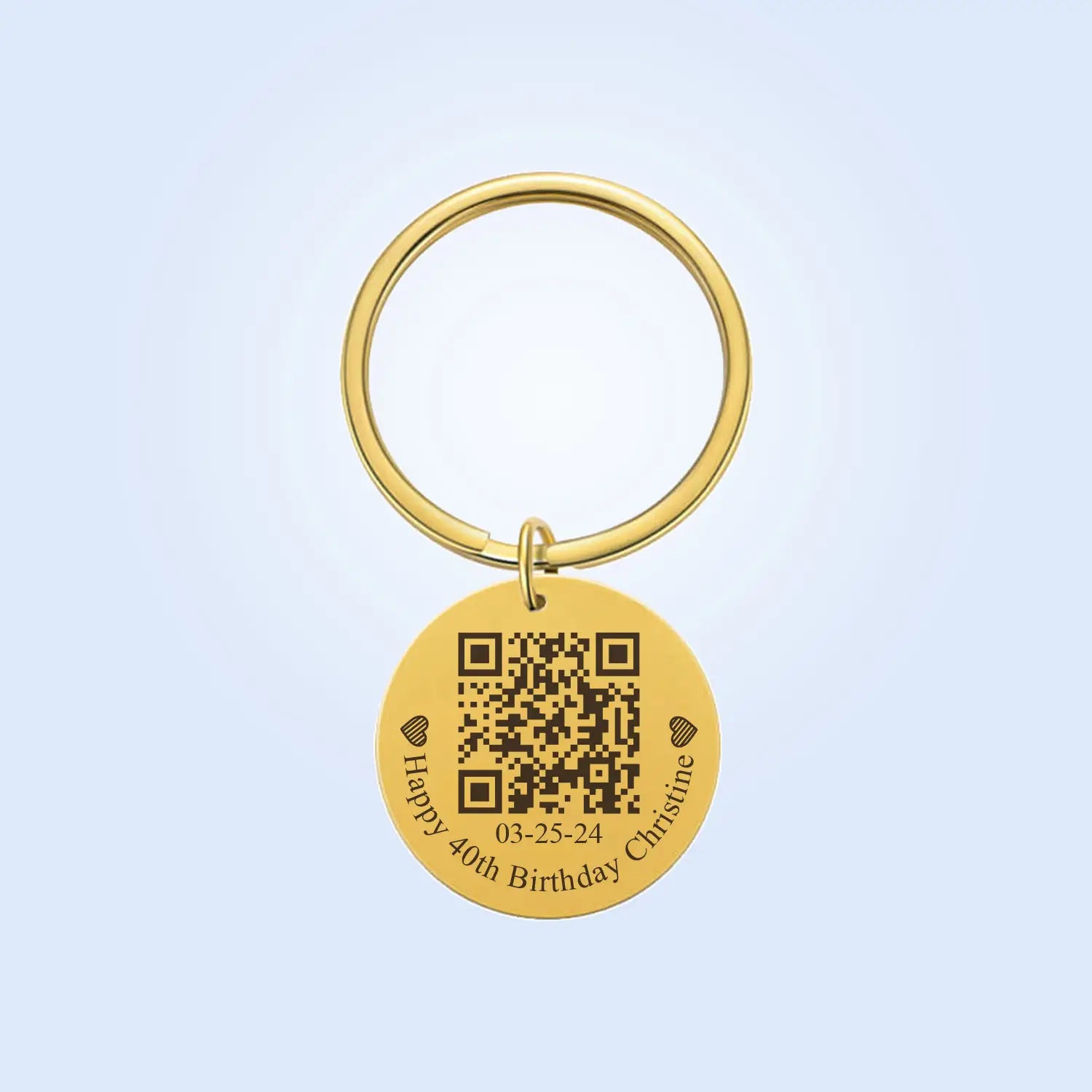 gold-colored circular keychain made of metal featuring a personalized qr code and engraved text happy 40th birthday christine with the date 03-25-24 as a custom fingerprint qr code keychain gift