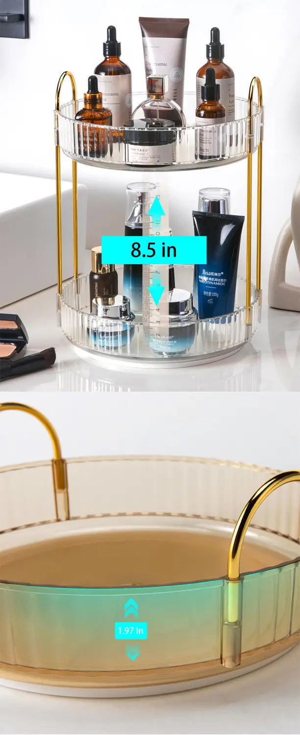 Klarer, zweistufiger, runder Dreh-Make-up-Organizer mit großer Speicherkapazität, goldfarbenen Metallstangengriffen und einem Verlauf von Beige zu Gold als Basis.