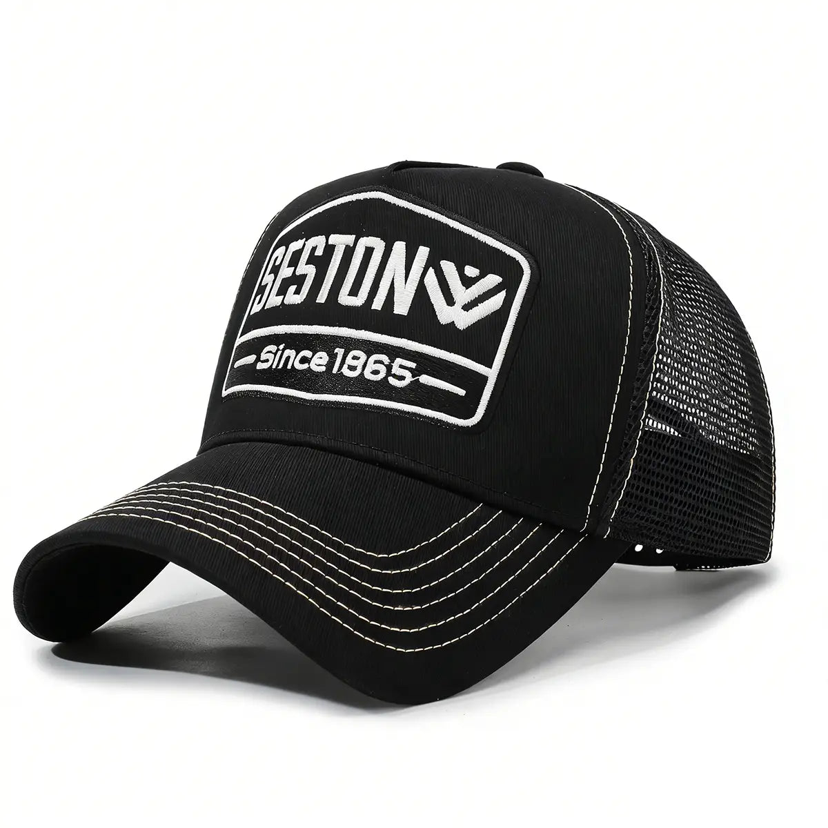 Black trucker hat with white embroidered Seston logo and mesh back in multi color style.