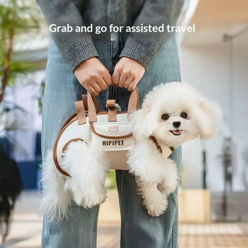 Cream-colored oxford cloth small dog carrier backpack with tan leather-like straps and a cute bear face design featuring fluffy white faux fur accents.