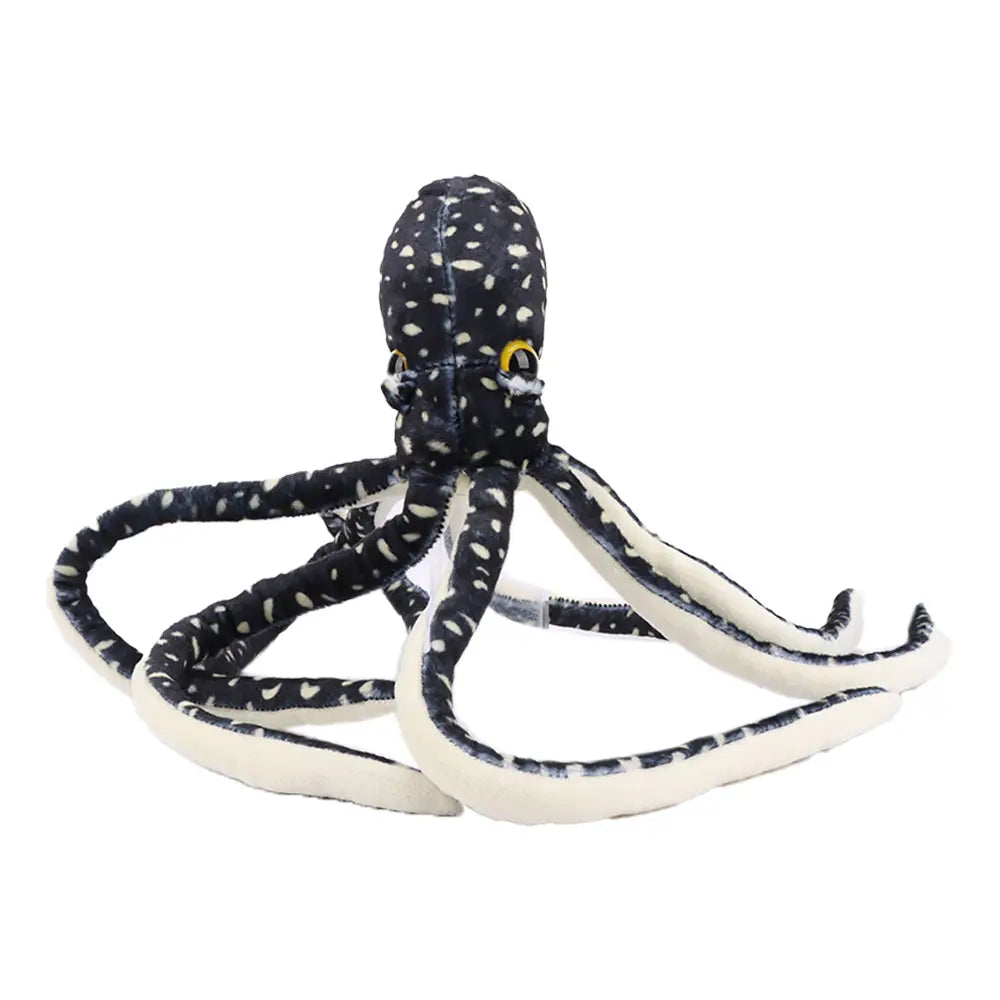 アカエイのぬいぐるみコレクションにある、黄色い目を備えた黒と白の斑点のドットタコのぬいぐるみで、ポルカドットのタコの詰め物動物で構成される