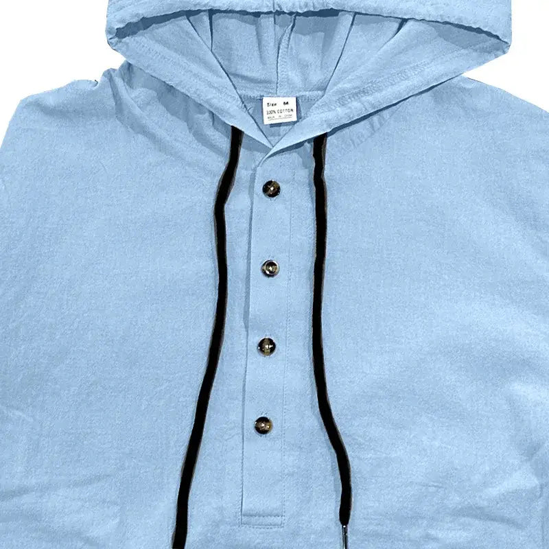 Men cotton linen hooded henley shirt in light blue cotton fabric with black drawstrings and metallic buttons.