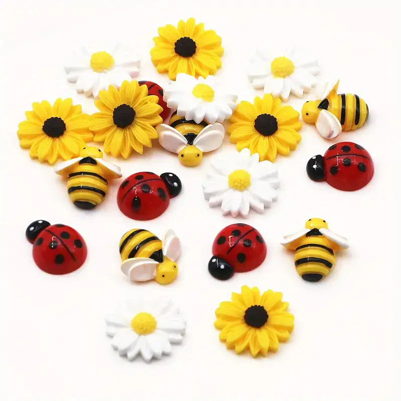 20pcs mixed resin daisy bee and ladybug flatback charms featuring bright yellow and white sunflowers with black centers, white daisies, striped bees, and red ladybugs.