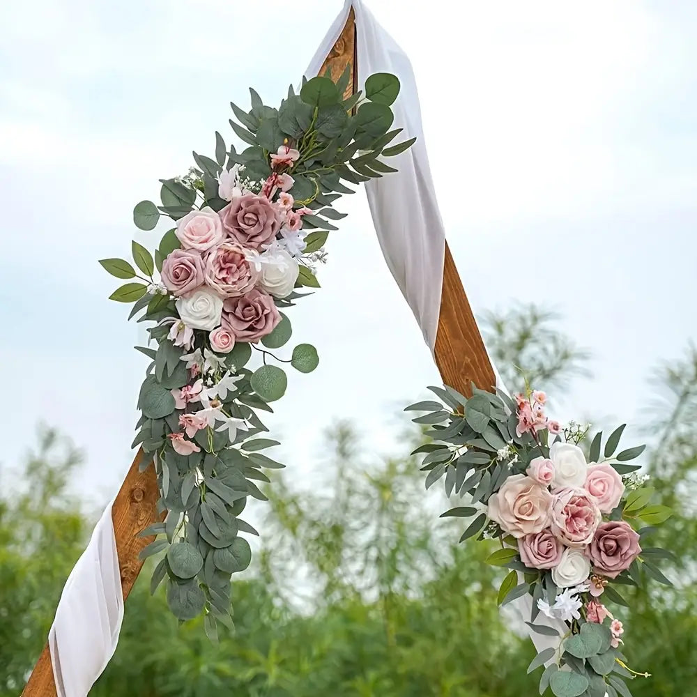 Juego de flores para arco de boda con rosas artificiales, que incluye una decoración delicada de arco floral con rosas rosa suave y blancas entrelazadas con abundantes hojas de eucalipto verdes.