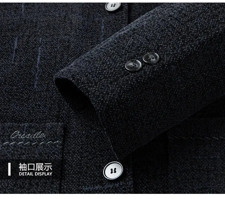 Men wool blend winter trench coat in dark charcoal featuring subtle vertical pinstripes and silver toned buttons.