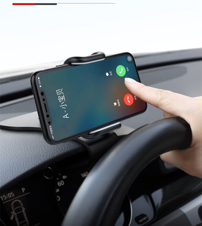 black plastic car phone holder with 360 rotatable feature mounted on dashboard holding a smartphone