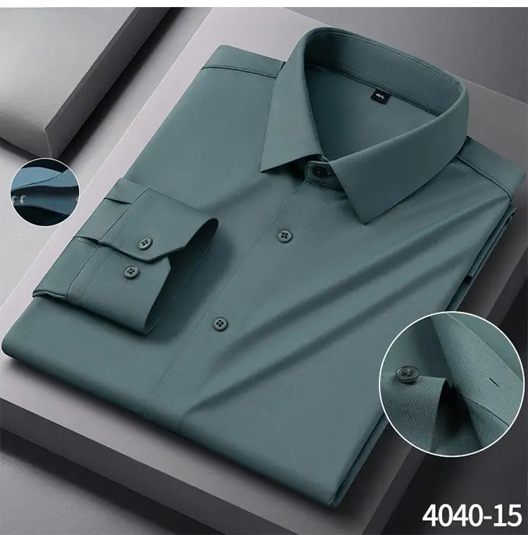 A sleek teal men’s slim fit nylon formal dress shirt with a crisp collar and buttoned cuffs.